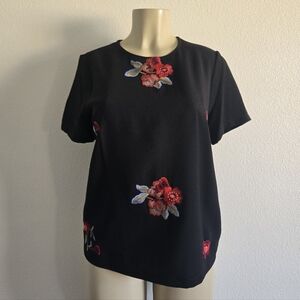 Renee C. Black Top with Red Floral Accents